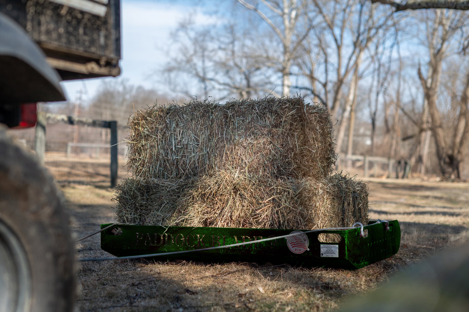 paddock green trailer with hay in